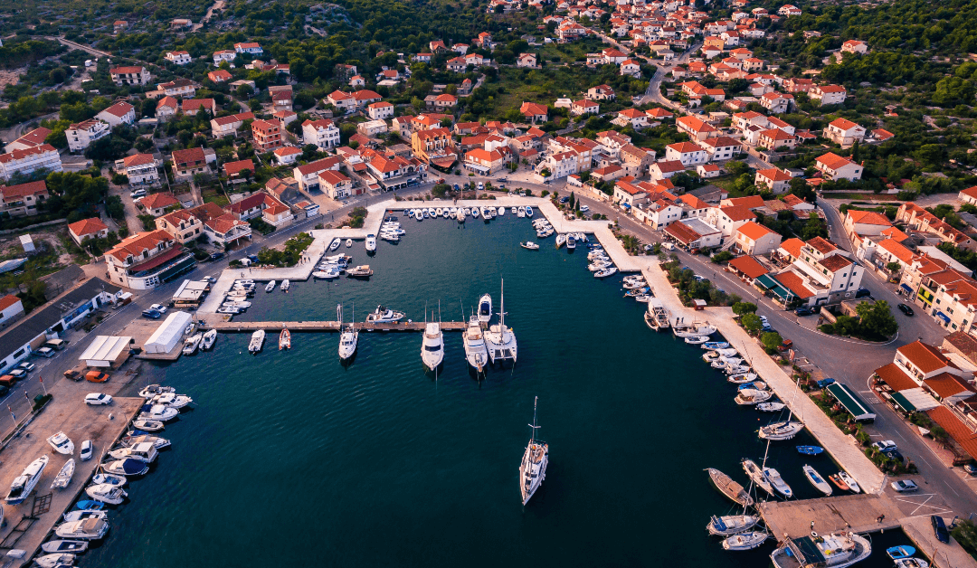 aerial drone view of small marina with boats and PHL9CA7 1